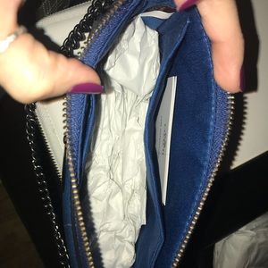Blue coach wristlet.
